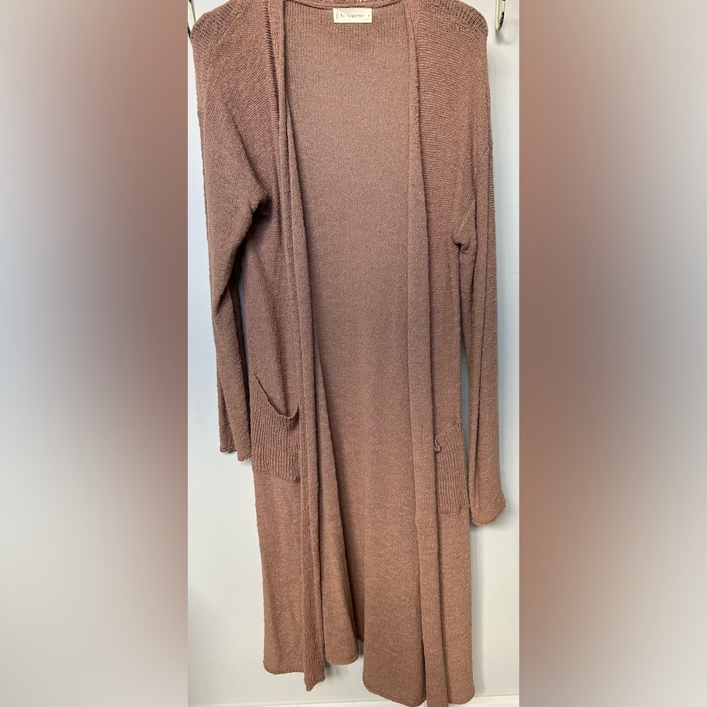 By Together cardigan in a peachy/tan color.